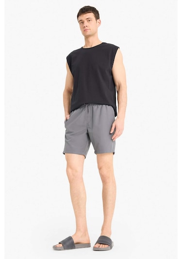 DeFacto Regular Fit Kısa Boy Cepli File Astarlı Beli Bağcıklı Düz Hafif Kumaş Deniz Şortu E5133AXNSGR474