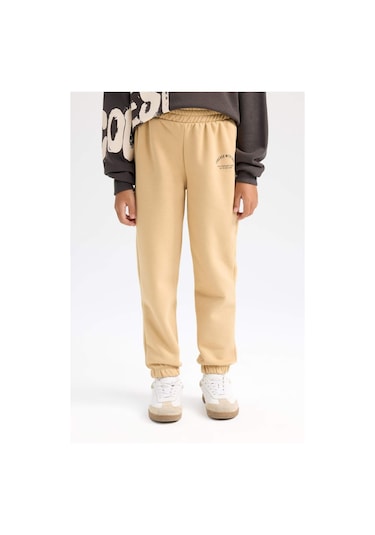 DeFacto Kız Çocuk Standart Fit Beli Paçası Lastikli Baskılı Jogger Eşofman Altı D2295A824WNBG68 Bej DeFacto Kız Çocuk Standart Fit Beli Paçası Lastikli Baskılı Jogger Eşofman Altı D2295A824WNBG68 Bej