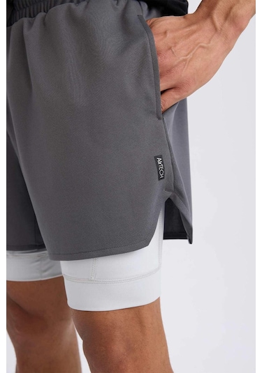 DeFactoFit Slim Fit Dar Kesim Sporcu Taytlı Şort E2760AX25SMAR58