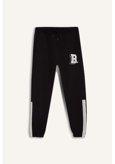 DeFactoFit NBA Boston Celtics Jogger Eşofman Altı Standart Fit Beli Bağcıklı Cepli Lastikli Paça D1562AX24WNBK81 Siyah DeFactoFit NBA Boston Celtics Jogger Eşofman Altı Standart Fit Beli Bağcıklı Cepli Lastikli Paça D1562AX24WNBK81 Siyah