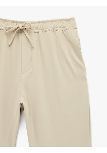 Koton Regular Fit Cepli Beli Bağcıklı Kumaş Pantolon Bej 6sam40014hw Ekru