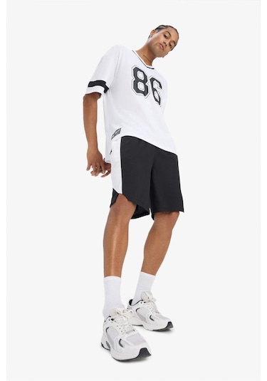 DeFactoFit Hızlı Kuruyan Standart Fit Sporcu Kısa Paça Şort E4127AX25SMBK81