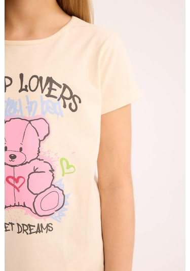 DeFacto Kız Çocuk Pijama Takımı Bisiklet Yaka Baskılı Kısa Kollu Üst Beli Lastikli Desenli Alt E0538A825SMER233 Ekru DeFacto Kız Çocuk Pijama Takımı Bisiklet Yaka Baskılı Kısa Kollu Üst Beli Lastikli Desenli Alt E0538A825SMER233 Ekru