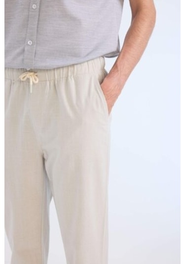 DeFacto %100 Pamuk Keten Görünümlü Yazlık Jogger Pantolon Dar Paça Beli Bağcıklı Lastikli Cepli Z6475AZ25SPGR94