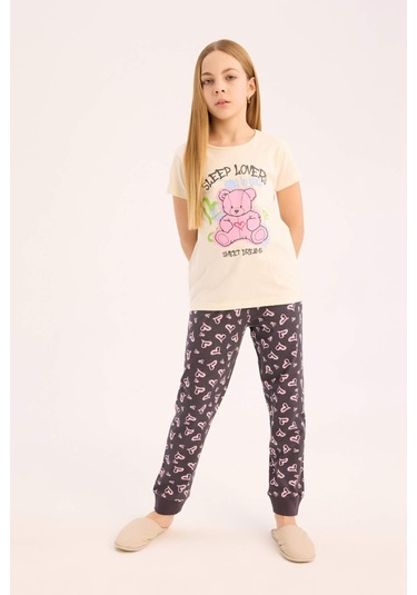 DeFacto Kız Çocuk Pijama Takımı Bisiklet Yaka Baskılı Kısa Kollu Üst Beli Lastikli Desenli Alt E0538A825SMER233 Ekru DeFacto Kız Çocuk Pijama Takımı Bisiklet Yaka Baskılı Kısa Kollu Üst Beli Lastikli Desenli Alt E0538A825SMER233 Ekru