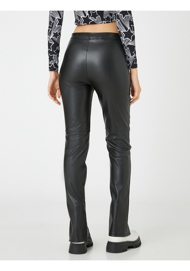 Koton Deri Görünümlü Tayt Paçaları Yırtmaç Detaylı Nervürlü Siyah 3wal40088ık Siyah SiYAH