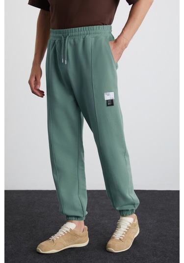 ROWAN Erkek Organik Pamuklu Relaxed Fit İçi Polarlı Süs etiketli Jogger Yeşil Eşofman Altı