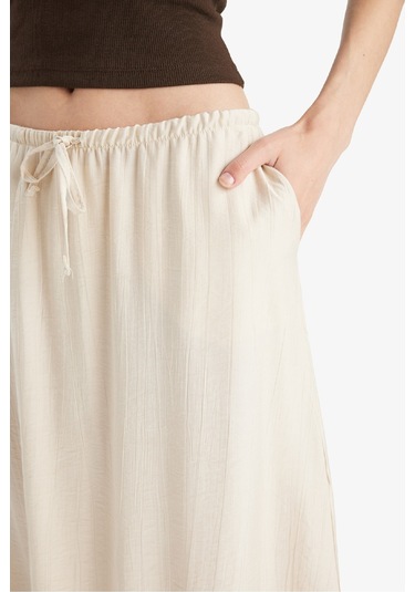 Defacto A Kesim Normal Bel Krinkıl Kumaş Midi Etek F6501ax25smbg776 Bej