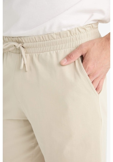 Defacto Slim Fit Dar Kesim Cepli Pamuklu Basic Düz Bermuda Şort - Bej W1105AZ25SPBG735