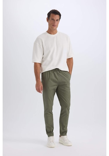 DeFacto %100 Pamuk Yazlık Jogger Chino Pantolon Beli Bağcıklı Cepli Düz Paça Z9933AZ25SPKH430 DeFacto %100 Pamuk Yazlık Jogger Chino Pantolon Beli Bağcıklı Cepli Düz Paça Z9933AZ25SPKH430