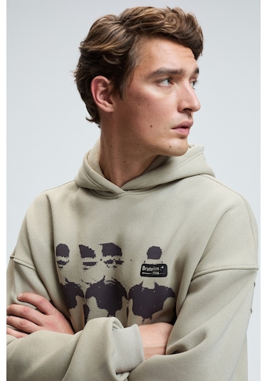 Grimelange ARMAND Erkek Kapüşonlu Kanguru Cepli Önü Baskılı Oversize Taş Rengi Sweatshirt