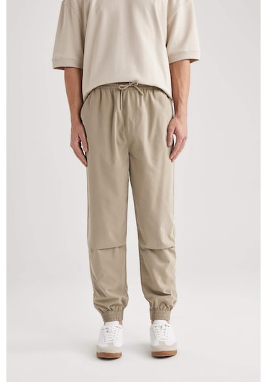 DeFacto Jogger Gabardin Pantolon Regular Beli Bağcıklı Cepli Lastikli Paça B7493AX24SPBG783
