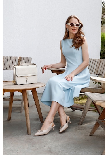 Gönderi R Ten Kısa İnce Topuklu Fiyonklu Arkası Açık Ayakkabı Ten