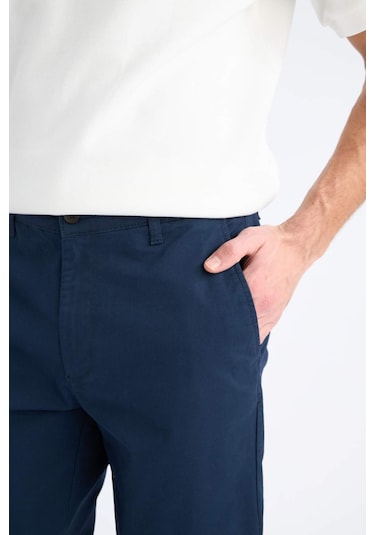 DeFacto Regular Fit Normal Kesim Yazlık Düz Paça Chino Kanvas Pantolon D7349AX25SPNV256 DeFacto Regular Fit Normal Kesim Yazlık Düz Paça Chino Kanvas Pantolon D7349AX25SPNV256