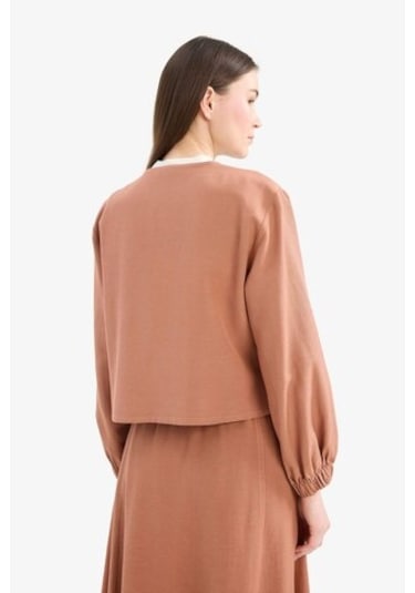 DeFacto Relax Fit Önden Bağlamalı Keten Uzun Kollu Tesettür Bluz E5352AX25SPBN566 DeFacto Relax Fit Önden Bağlamalı Keten Uzun Kollu Tesettür Bluz E5352AX25SPBN566