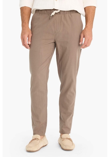 DeFacto %100 Pamuk Keten Görünümlü Yazlık Jogger Pantolon Dar Paça Beli Bağcıklı Lastikli Cepli Z6475AZ25SPBN571 DeFacto %100 Pamuk Keten Görünümlü Yazlık Jogger Pantolon Dar Paça Beli Bağcıklı Lastikli Cepli Z6475AZ25SPBN571