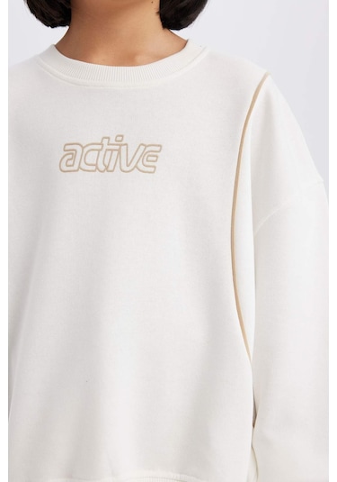 DeFacto Kız Çocuk Oversize Geniş Kalıp Bisiklet Yaka Baskılı Sweatshirt D9784A825SPER105 Ekru DeFacto Kız Çocuk Oversize Geniş Kalıp Bisiklet Yaka Baskılı Sweatshirt D9784A825SPER105 Ekru