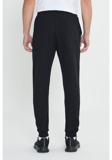 AC&Co / Altınyıldız Classics Standart Fit Normal Kesim Pamuklu Baskılı Cepli Erkek Eşofman Altı Siyah