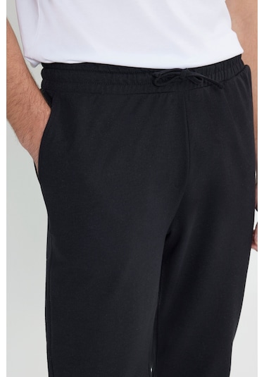 AC&Co / Altınyıldız Classics Standart Fit Normal Kesim Pamuklu Baskılı Cepli Erkek Eşofman Altı Siyah