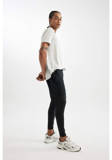 DeFactoFit Slim Fit Dar Kesim Sporcu Uzun Taytlı Dokuma Şort A9124AX24AUBK81