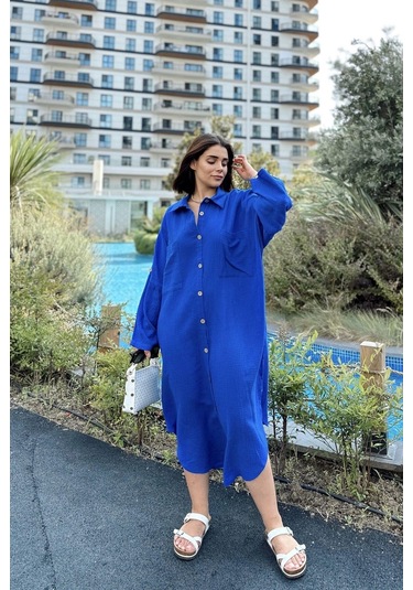 Kadın Saks Muslin Kumaş, Yarasa Kol, Eteği Oval, Çift Cepli, Uzun Oversize Salaş Gömlek Elbise Saks Kadın Saks Muslin Kumaş, Yarasa Kol, Eteği Oval, Çift Cepli, Uzun Oversize Salaş Gömlek Elbise Saks