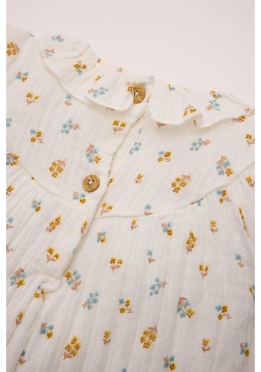 DeFacto Kız Bebek Müslin Çiçek Desenli Fırfırlı Yaka Uzun Kollu Gömlek D8764A524WNER105 Ekru DeFacto Kız Bebek Müslin Çiçek Desenli Fırfırlı Yaka Uzun Kollu Gömlek D8764A524WNER105 Ekru