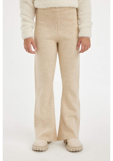 Defacto Kız Çocuk Flare Fit İspanyol Paça Basic Düz Triko Pantolon A6029A824WNBG588 Bej Defacto Kız Çocuk Flare Fit İspanyol Paça Basic Düz Triko Pantolon A6029A824WNBG588 Bej