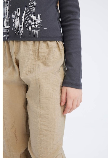 DeFacto Kız Çocuk Beli Lastikli Düz Paça Paraşüt Pantolon D7605A825SMBG414 Bej