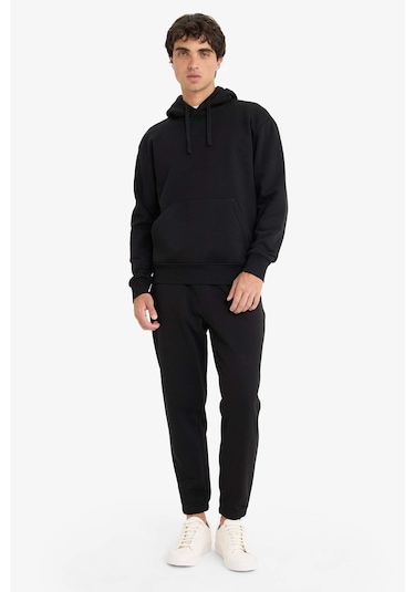 Defacto - Regular Fit Beli Bağcıklı Cepli Paçası Lastikli Şardonlu Basic Düz Jogger Eşofman Altı E6326AX25AU Siyah Defacto - Regular Fit Beli Bağcıklı Cepli Paçası Lastikli Şardonlu Basic Düz Jogger Eşofman Altı E6326AX25AU Siyah