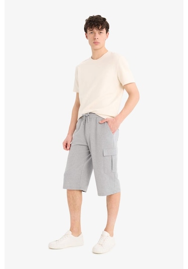 DeFacto Slim Fit Dar Kesim Kargo Cepli Basic Düz Kapri Şort T4693AZ25SMGR210 DeFacto Slim Fit Dar Kesim Kargo Cepli Basic Düz Kapri Şort T4693AZ25SMGR210