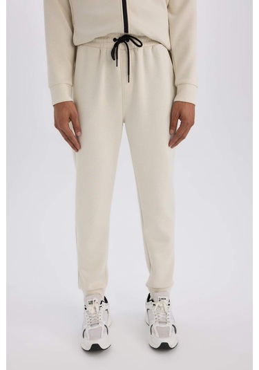 DeFactoFit Slim Fit Sporcu İnce Jogger Eşofman Altı Dar Kesim Skuba Dalgıç Kumaş Standart Paça Beli Bağcıklı Lastikli Paça Z9112AZ25SPBG721 DeFactoFit Slim Fit Sporcu İnce Jogger Eşofman Altı Dar Kesim Skuba Dalgıç Kumaş Standart Paça Beli Bağcıklı Lastikli Paça Z9112AZ25SPBG721