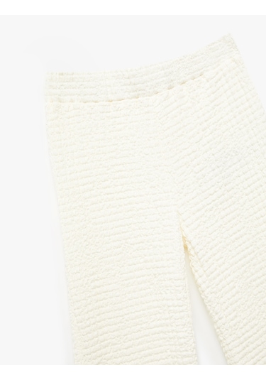 Koton Beli Lastikli Dokulu İspanyol Paça Pantolon Bej 5skg40179ak Ekru