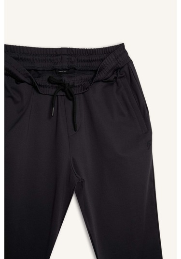 DeFactoFit Sporcu Jogger Eşofman Altı Slim Fit Dar Kesim Standart Paça Skuba Dalgıç Kumaş Beli Lastikli Düz Paça E3930AX24WNAR206 Antrasit