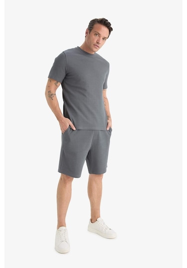 DeFacto Regular Fit Dokulu Beli Bağcıklı Şort E2588AX25SMAR58 DeFacto Regular Fit Dokulu Beli Bağcıklı Şort E2588AX25SMAR58
