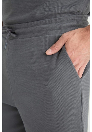 DeFacto Regular Fit Dokulu Beli Bağcıklı Şort E2588AX25SMAR58 DeFacto Regular Fit Dokulu Beli Bağcıklı Şort E2588AX25SMAR58