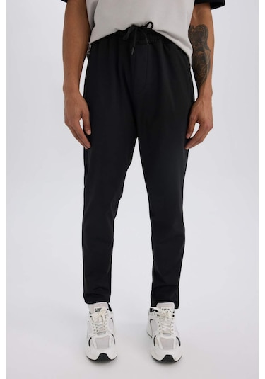 DeFactoFit Sporcu Jogger Eşofman Altı Slim Fit Dar Kesim Standart Paça Skuba Dalgıç Kumaş Beli Lastikli Düz Paça E3930AX24WNBK81 Siyah
