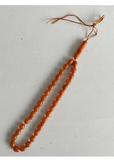Oval Kesim Kokulu Toz Kehribar Tesbih 33lük 7mm A008