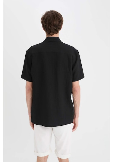 DeFacto Regular Fit Polo Yaka Krinkıl Yazlık Kısa Kollu Siyah Gömlek E1223AX25SMBK27 DeFacto Regular Fit Polo Yaka Krinkıl Yazlık Kısa Kollu Siyah Gömlek E1223AX25SMBK27