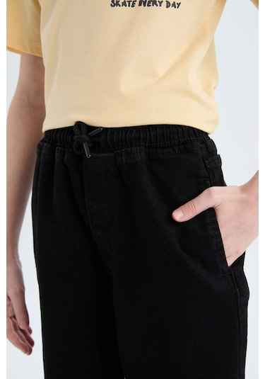 DeFacto Erkek Çocuk Jogger Fit Esnek Bantlı Paça Jean Pantolon D6552A825SPNM40