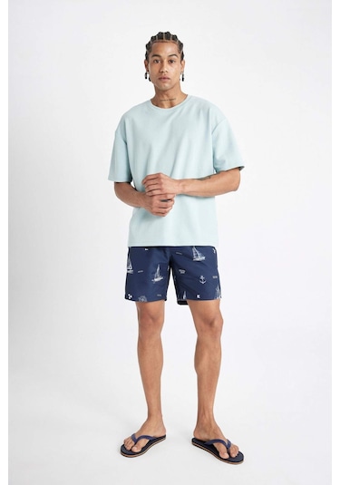 DeFacto Regular Fit Desenli File Astarlı Kısa Boy Deniz Şortu M8344AZ24HSNV256 DeFacto Regular Fit Desenli File Astarlı Kısa Boy Deniz Şortu M8344AZ24HSNV256