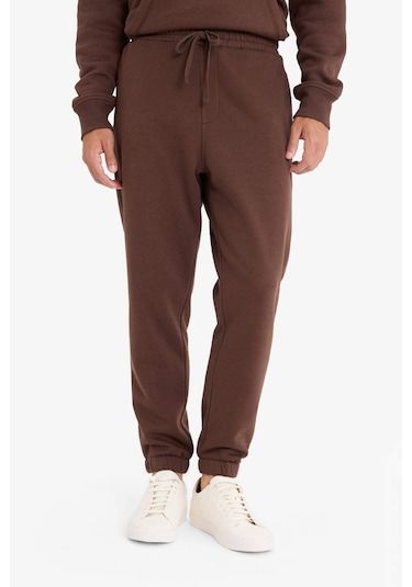 Defacto Regular Fit Beli Bağcıklı Cepli Paçası Lastikli Şardonlu Basic Düz Jogger Eşofman Altı E6326ax25aubn539 Kahve-bn539 Defacto Regular Fit Beli Bağcıklı Cepli Paçası Lastikli Şardonlu Basic Düz Jogger Eşofman Altı E6326ax25aubn539 Kahve-bn539