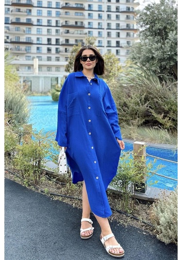 Kadın Saks Muslin Kumaş, Yarasa Kol, Eteği Oval, Çift Cepli, Uzun Oversize Salaş Gömlek Elbise Saks Kadın Saks Muslin Kumaş, Yarasa Kol, Eteği Oval, Çift Cepli, Uzun Oversize Salaş Gömlek Elbise Saks