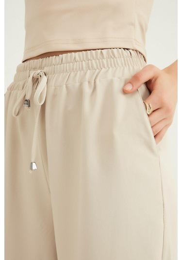 Beli Lastikli Bol Paça Pantolon Taş Taş