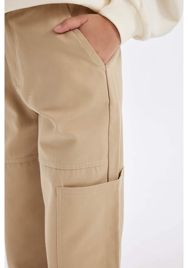 DeFacto Kız Çocuk Kargo Cepli Beli ve Paçası Lastikli Pamuklu Paraşüt Pantolon C8843A824AUBG203 Bej