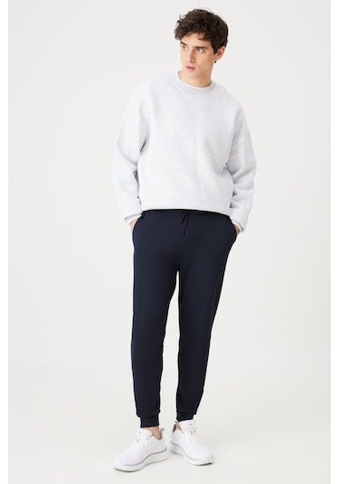 AC&Co / Altınyıldız Classics Standart Fit Normal Kesim Pamuklu Baskılı Cepli Erkek Eşofman Altı Lacivert