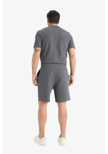 DeFacto Regular Fit Dokulu Beli Bağcıklı Şort E2588AX25SMAR58 DeFacto Regular Fit Dokulu Beli Bağcıklı Şort E2588AX25SMAR58