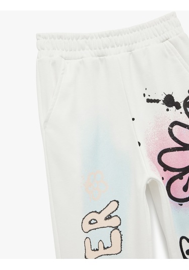 Koton Şardonlu Beli Lastikli Baskılı Jogger Eşofman Altı Ekru 6wkg40049ak Ekru