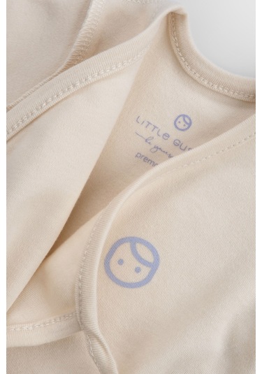 Ters Dikişli Organik Pamuk Ekru Prematüre Kruvaze Patikli Tulum Ekru