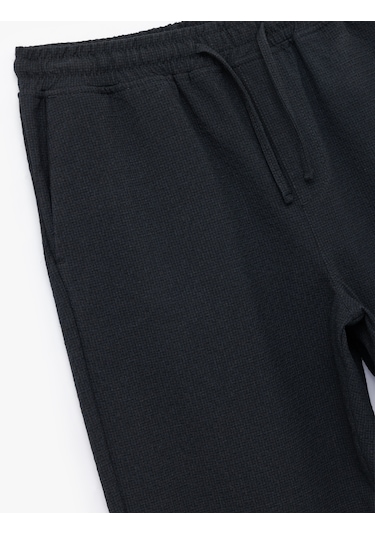 Koton Viskon Karışımlı Cep Detaylı Dokulu Beli Bağcıklı Pantolon Lacivert 6wam40089hw Lacivert Koton Viskon Karışımlı Cep Detaylı Dokulu Beli Bağcıklı Pantolon Lacivert 6wam40089hw Lacivert