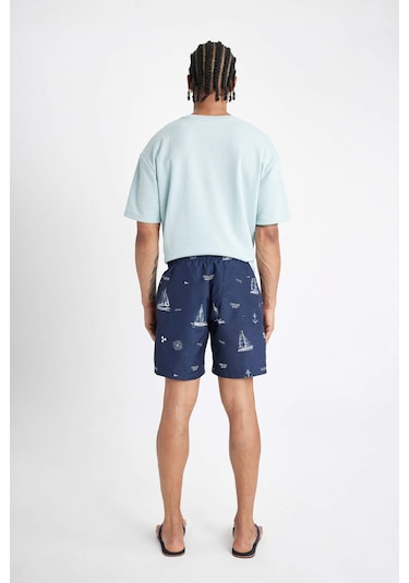 DeFacto Regular Fit Desenli File Astarlı Kısa Boy Deniz Şortu M8344AZ24HSNV256 DeFacto Regular Fit Desenli File Astarlı Kısa Boy Deniz Şortu M8344AZ24HSNV256